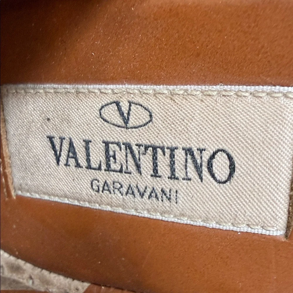 These are Valentino Garavani Rockstud textured-leather espadrille wedge heel